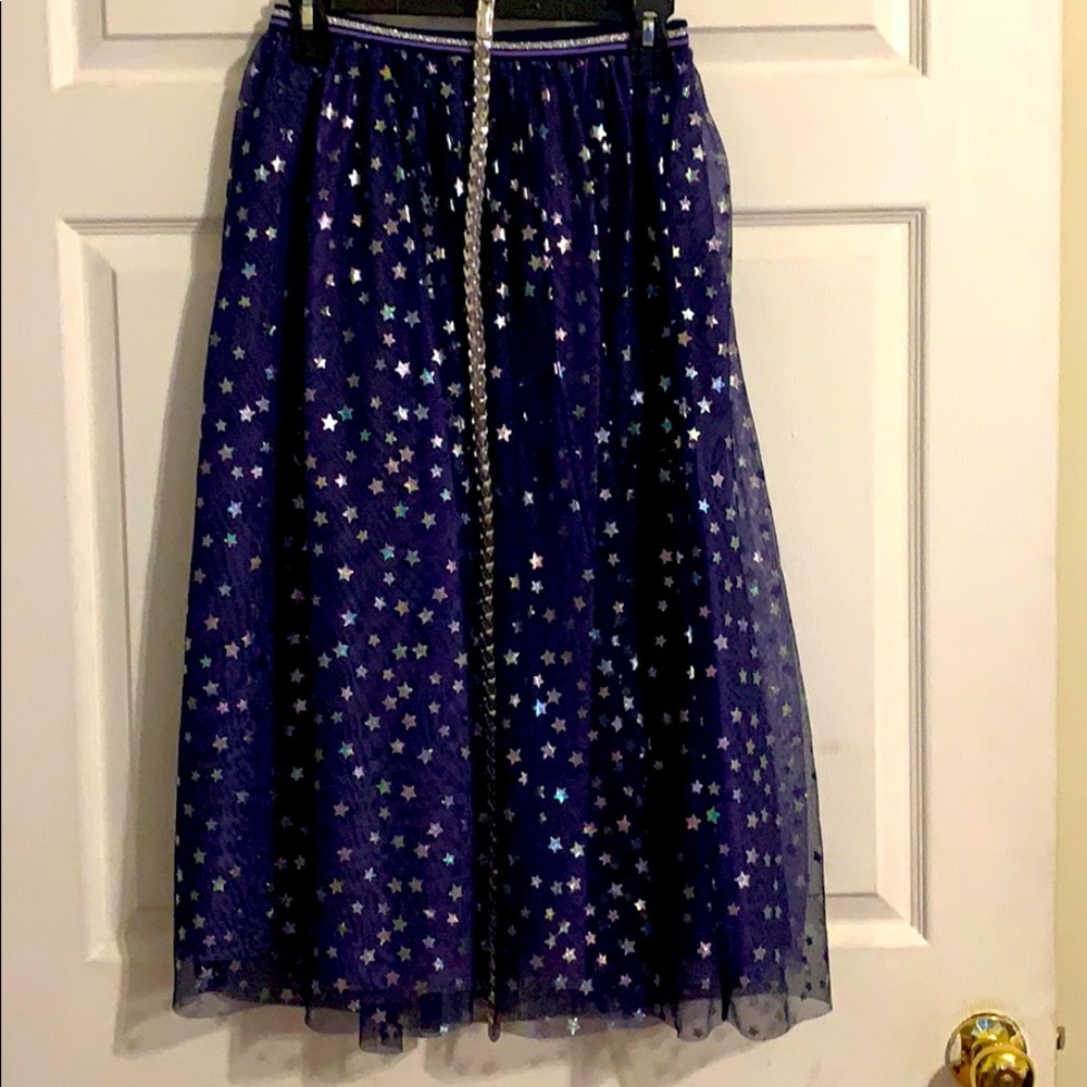 Girls navy and silver skirt with silver belt.